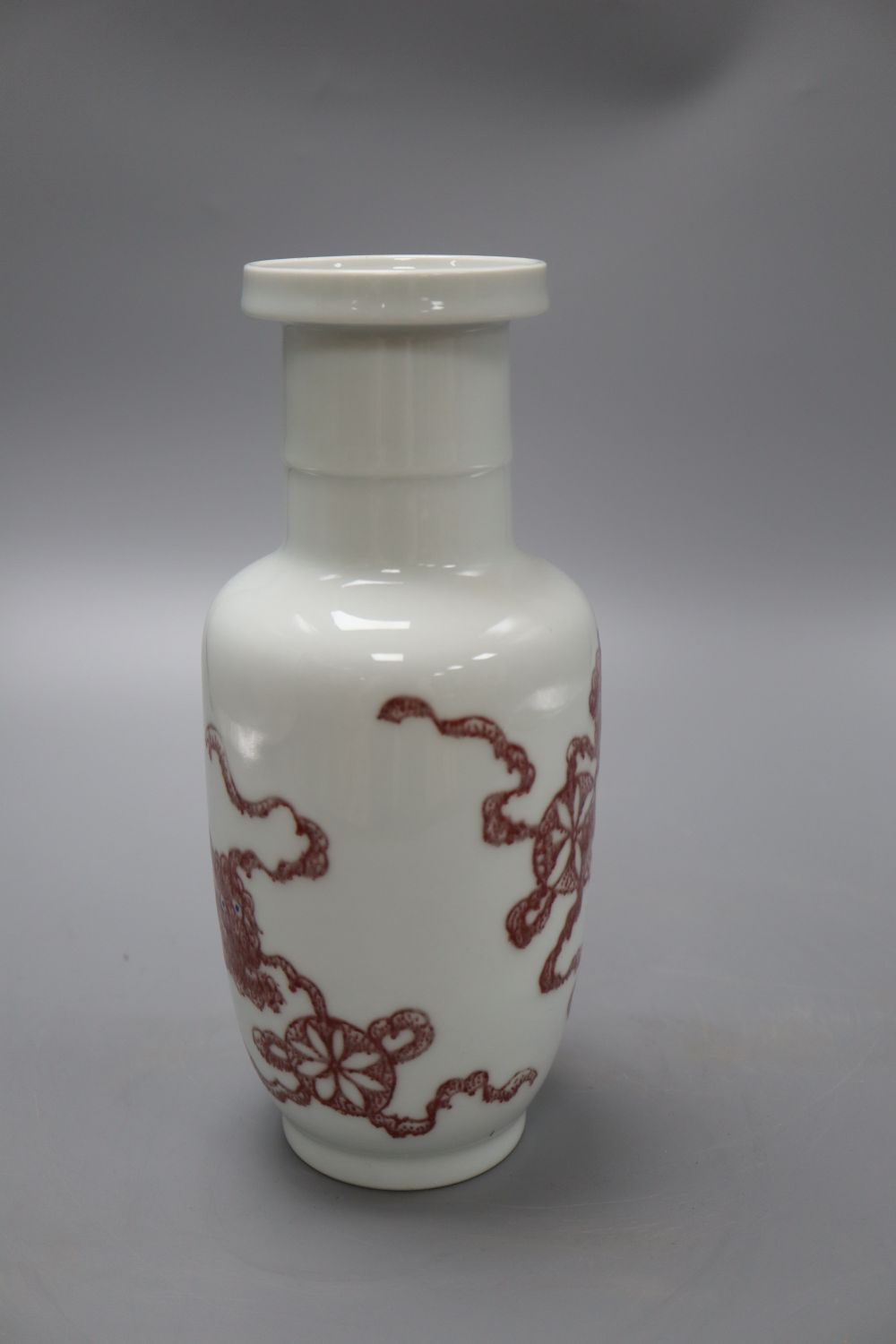 A Chinese underglaze copper red rouleau vase, height 24cm